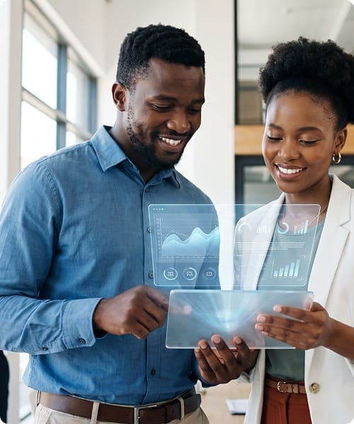 Two colleagues reviewing analytics dashboards on a tablet